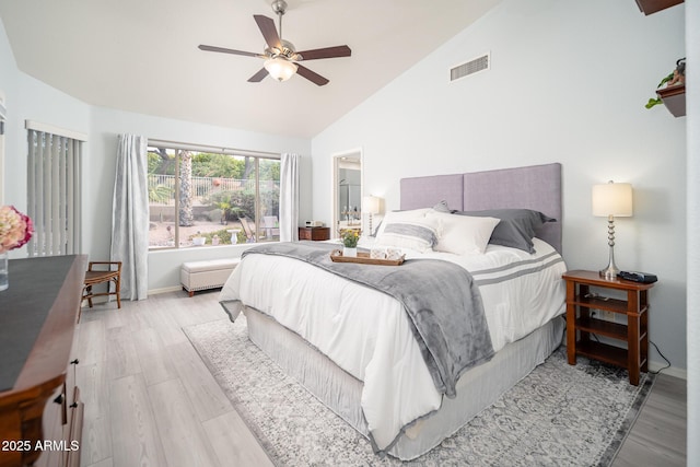 835 W Beechnut Dr, Chandler, AZ 85248 - bedroom with light wood-style floors, high vaulted ceiling, and ceiling fan