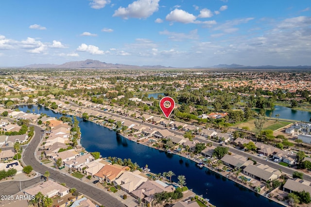 835 W Beechnut Dr, Chandler, AZ 85248 - aerial overview of property's location with nearby suburban area and a water and mountain view