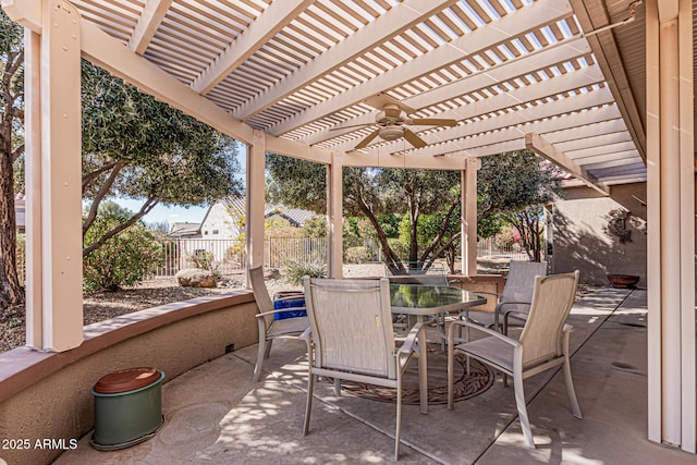 view of patio / terrace featuring ceiling fan and a pergola