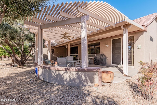 back of property with a patio and a pergola