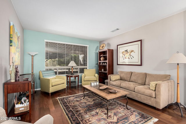 living room with dark hardwood / wood-style floors