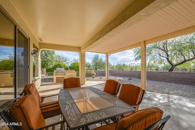 view of patio with a grill and area for grilling