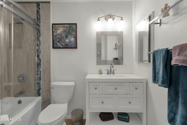 full bathroom with toilet, vanity, and tiled shower / bath combo