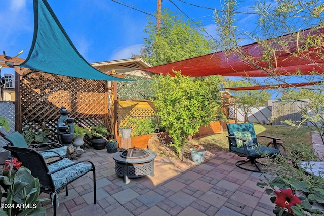 view of patio / terrace with a fire pit