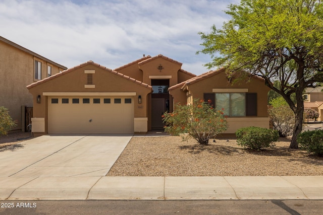 3843 E Citrine Rd, San Tan Valley, AZ 85143 - mediterranean / spanish home featuring stucco siding, driveway, a garage, and a tile roof