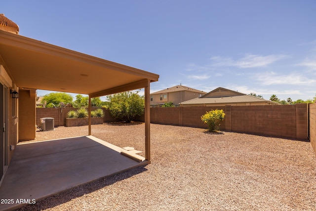 3843 E Citrine Rd, San Tan Valley, AZ 85143 - fenced backyard with cooling unit and a patio area