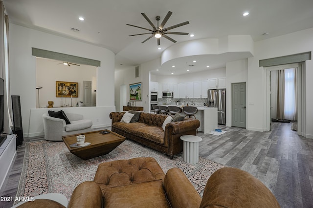 8136 E Beardsley Rd, Scottsdale, AZ 85255 - living room with light hardwood / wood-style floors and ceiling fan