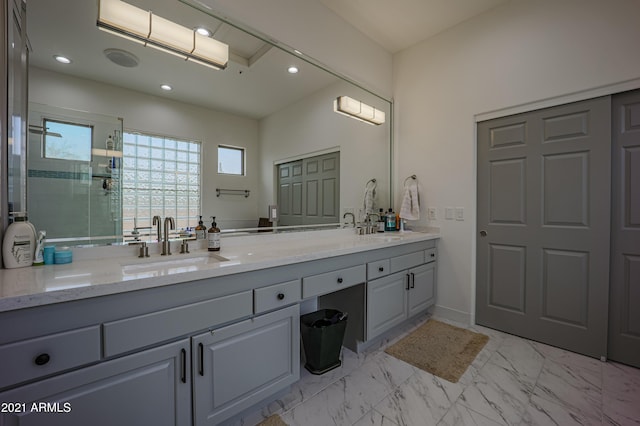 bathroom featuring vanity and walk in shower