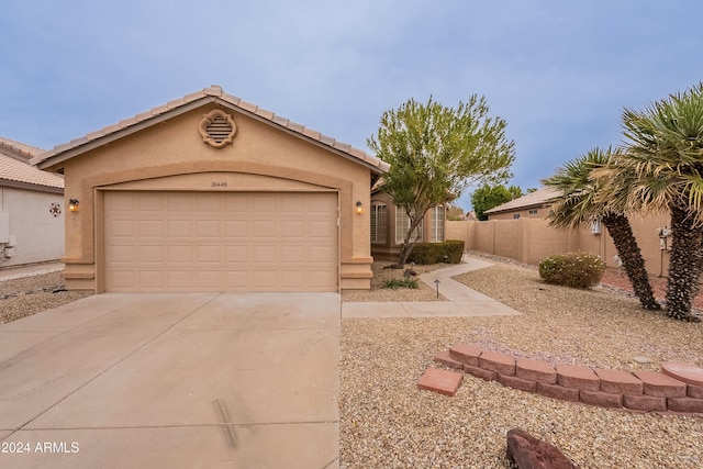 ranch-style house with a garage