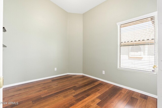 unfurnished room featuring hardwood / wood-style floors