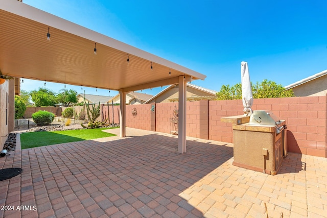 view of patio with an outdoor kitchen