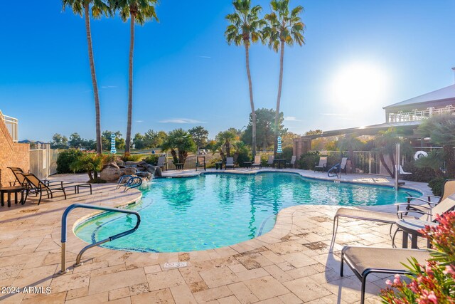 view of pool featuring a patio