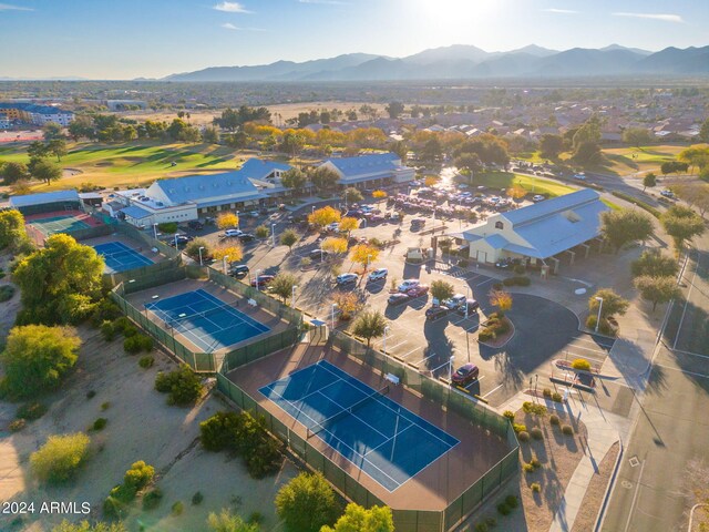 birds eye view of property with a mountain view