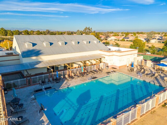 view of swimming pool featuring a patio area