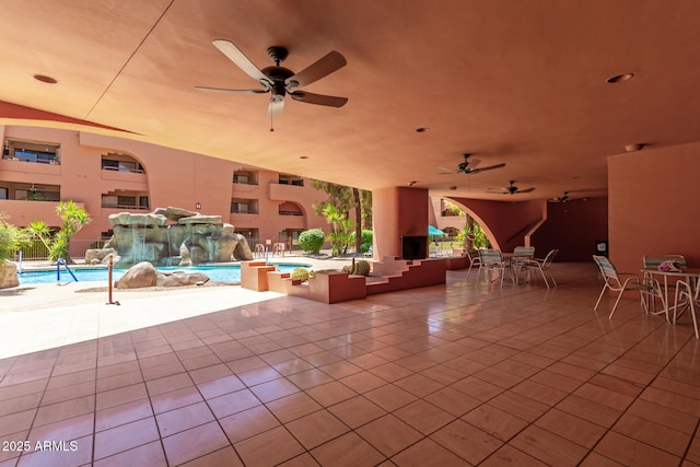 12222 N Paradise Village Pkwy S Unit 237, Phoenix, AZ 85032 - view of patio / terrace featuring ceiling fan, a community pool, and outdoor dining area