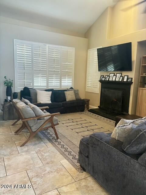 living room with vaulted ceiling