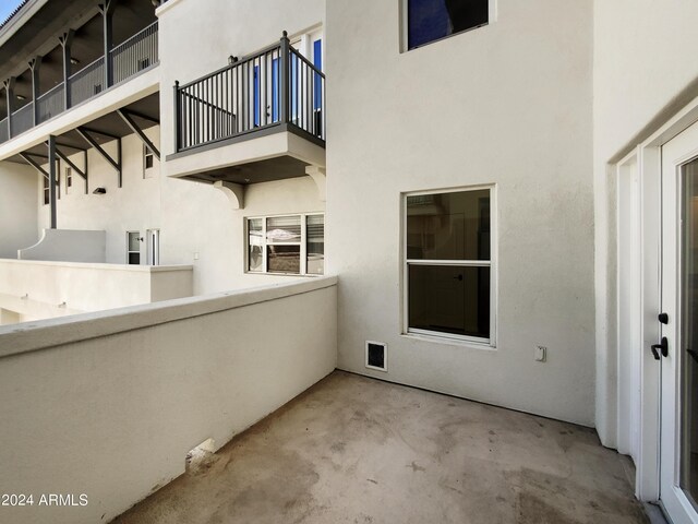 view of patio with a balcony