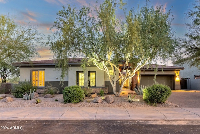 view of front of property featuring a garage