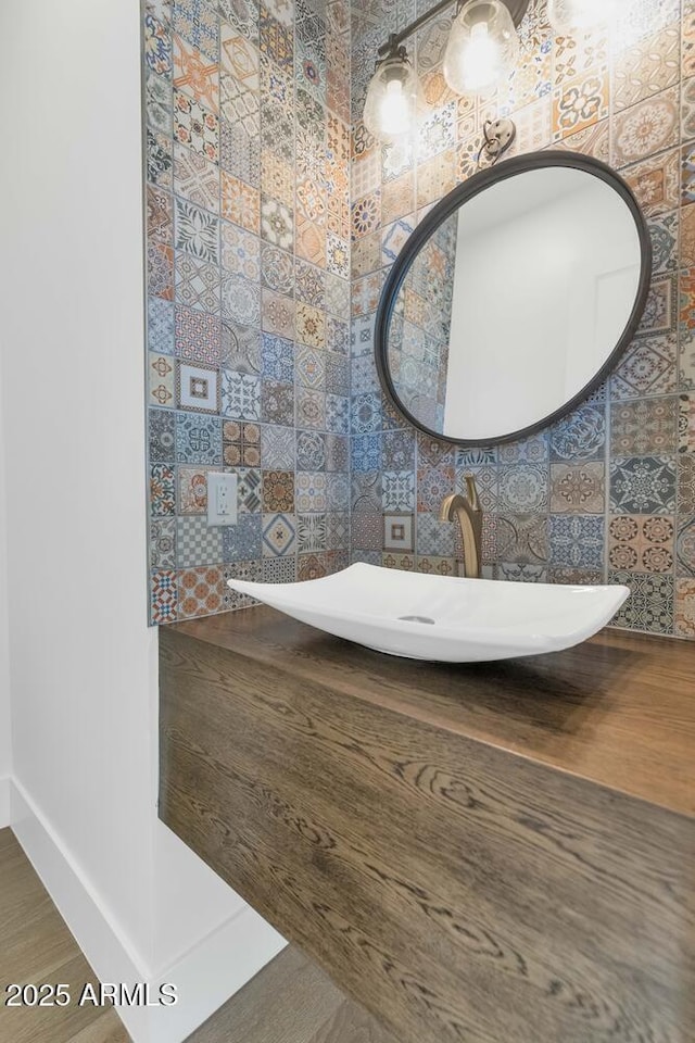 301 E Jomax Rd, Phoenix, AZ 85085 - bathroom featuring a sink and wood finished floors