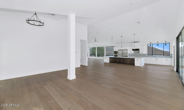 301 E Jomax Rd, Phoenix, AZ 85085 - unfurnished living room featuring wood finished floors