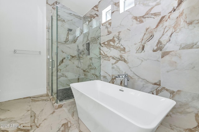 301 E Jomax Rd, Phoenix, AZ 85085 - bathroom featuring a marble finish shower, a freestanding tub, and marble tiled floors