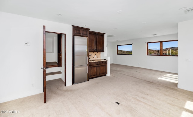 301 E Jomax Rd, Phoenix, AZ 85085 - unfurnished living room featuring light carpet, baseboards, and recessed lighting