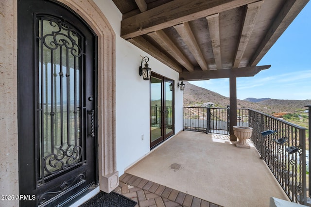 301 E Jomax Rd, Phoenix, AZ 85085 - entrance to property featuring a mountain view, a balcony, and stucco siding