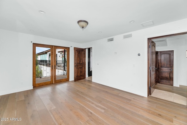 301 E Jomax Rd, Phoenix, AZ 85085 - unfurnished room with french doors, light wood finished floors, recessed lighting, and baseboards