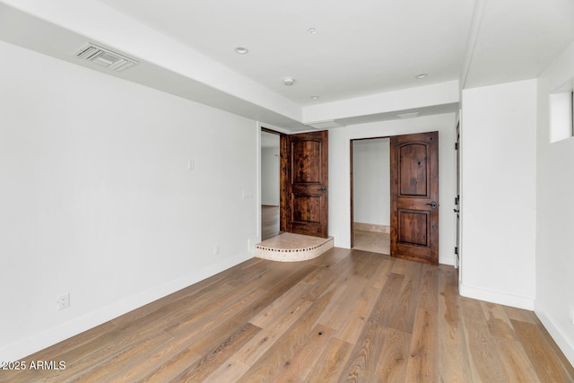 301 E Jomax Rd, Phoenix, AZ 85085 - unfurnished bedroom featuring light wood-type flooring and baseboards