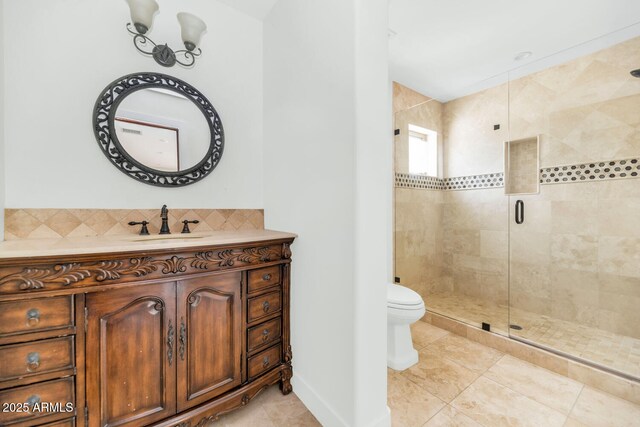 301 E Jomax Rd, Phoenix, AZ 85085 - full bathroom featuring a shower stall, toilet, vanity, and tile patterned floors