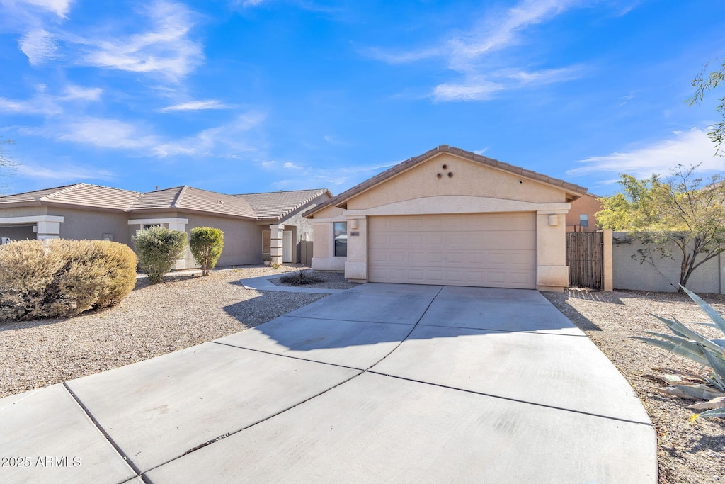 single story home with a garage