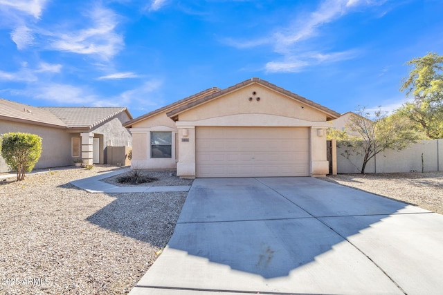 ranch-style home with a garage