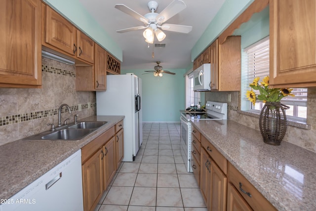 3098 N Starlight Dr, Prescott Valley, AZ 86314 - kitchen featuring white appliances, a sink, tasteful backsplash, and a ceiling fan