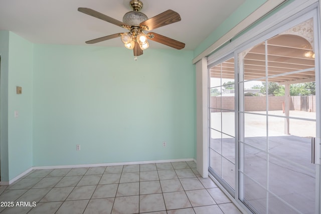 3098 N Starlight Dr, Prescott Valley, AZ 86314 - empty room with baseboards, light tile patterned flooring, and a ceiling fan