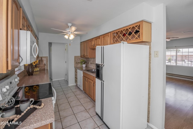 3098 N Starlight Dr, Prescott Valley, AZ 86314 - kitchen featuring white appliances, ceiling fan, light countertops, decorative backsplash, and light tile patterned floors
