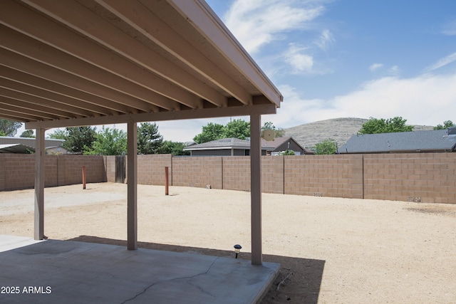3098 N Starlight Dr, Prescott Valley, AZ 86314 - fenced backyard featuring a patio area and a mountain view