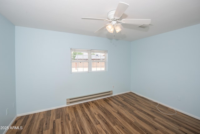 3098 N Starlight Dr, Prescott Valley, AZ 86314 - unfurnished room with baseboard heating, wood finished floors, baseboards, and ceiling fan