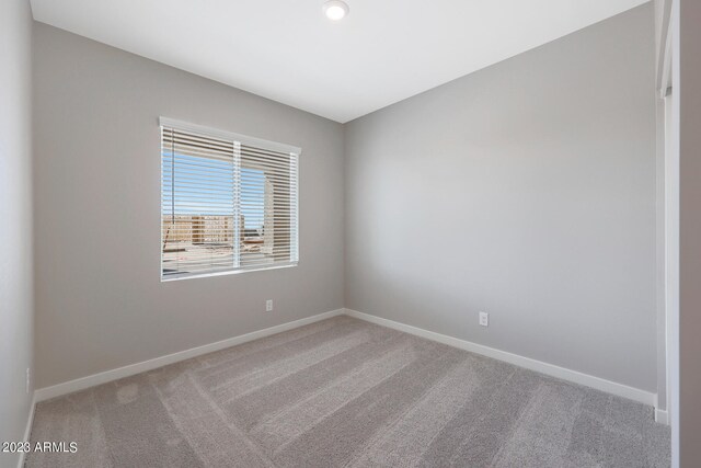 empty room featuring carpet flooring