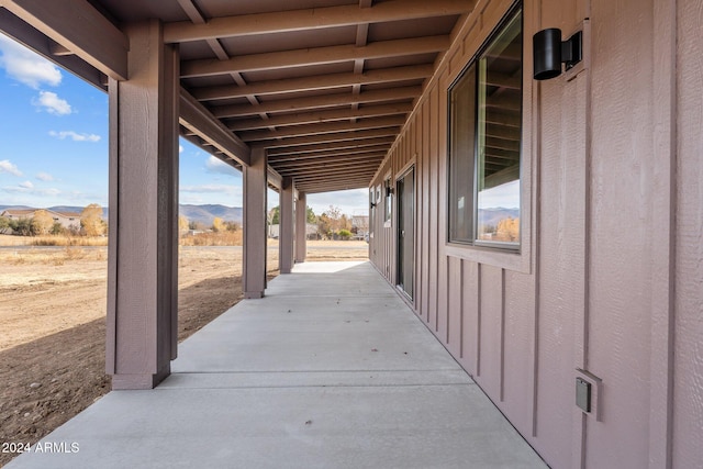 view of patio / terrace with a mountain view