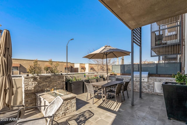 view of patio with a grill