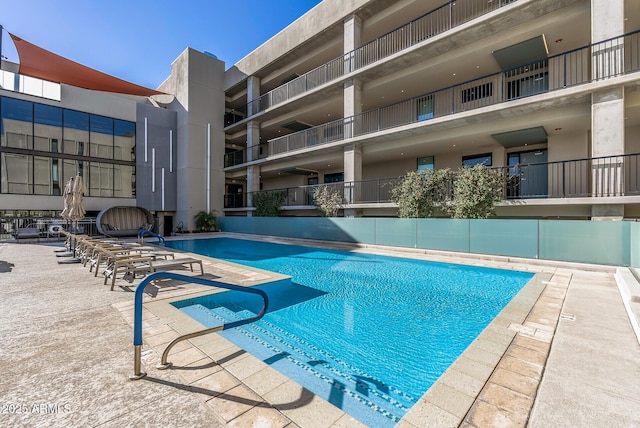 view of swimming pool featuring a patio