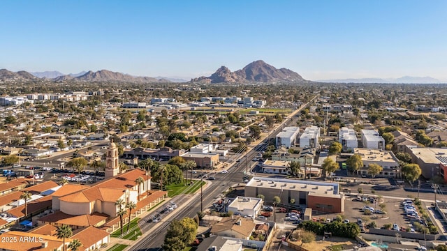 birds eye view of property featuring a mountain view