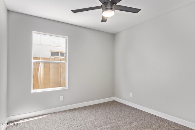 1408 E Carson Rd, Phoenix, AZ 85042 - spare room with baseboards, a ceiling fan, and carpet flooring