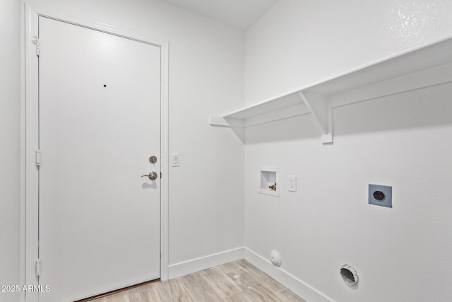 1408 E Carson Rd, Phoenix, AZ 85042 - washroom featuring laundry area, washer hookup, baseboards, light wood-type flooring, and hookup for an electric dryer