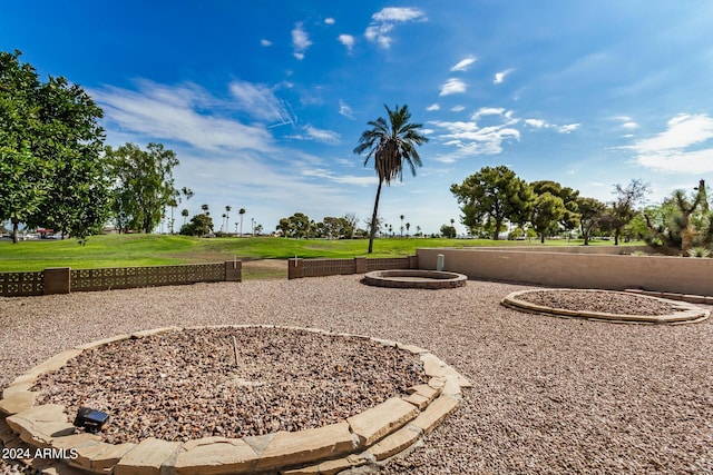 surrounding community featuring a yard