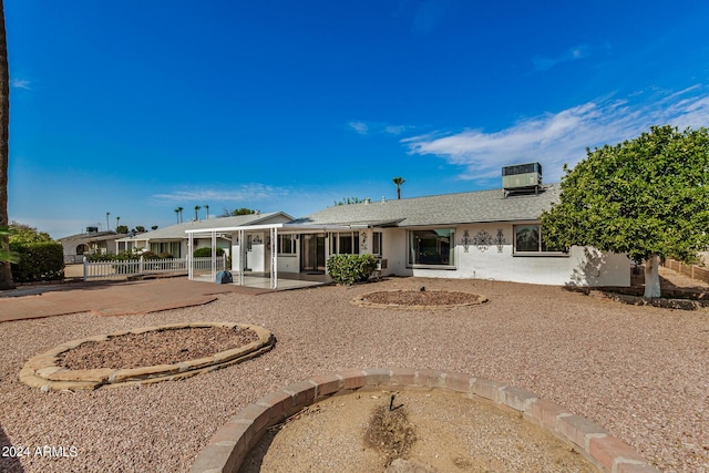 back of house with a patio area