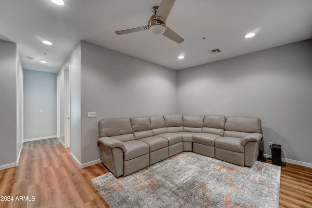 unfurnished living room featuring light hardwood / wood-style floors and ceiling fan