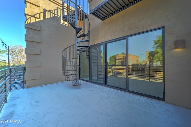 view of patio / terrace featuring a balcony