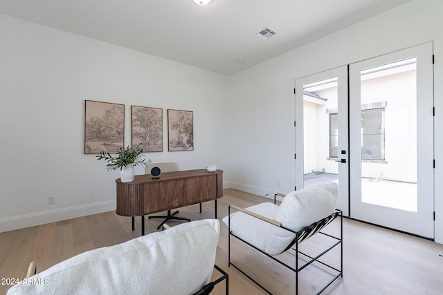 home office featuring light wood-type flooring