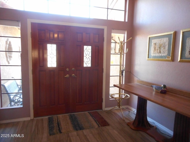 9203 W Behrend Dr, Peoria, AZ 85382 - foyer entrance featuring wood finished floors and baseboards